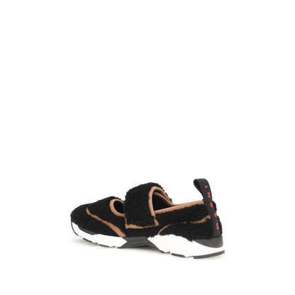 Athletic Sneakers by Marni for women in nylon black showcases a architectural silhouette, artfully capturing the essence of the Women's Athletic Nylon Sneakers with its signature architectural athletic style construction.
