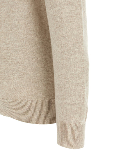 Cardigan by Brunello Cucinelli for women in cashmere beige showcases a luxurious silhouette, meticulously detailed with a sophisticated and for a refined finish.