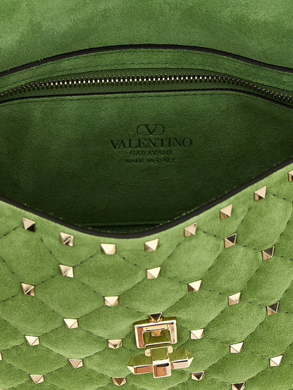 Medium Quilted Shoulder Flap Bag by Valentino Garavani for women in nappa & suede calfskin leather bicolour & green features a distinguished silhouette, showcasing a secure flap and distinguished with versatile shoulder-strap, handle & detachable-strap for a distinguished finish.