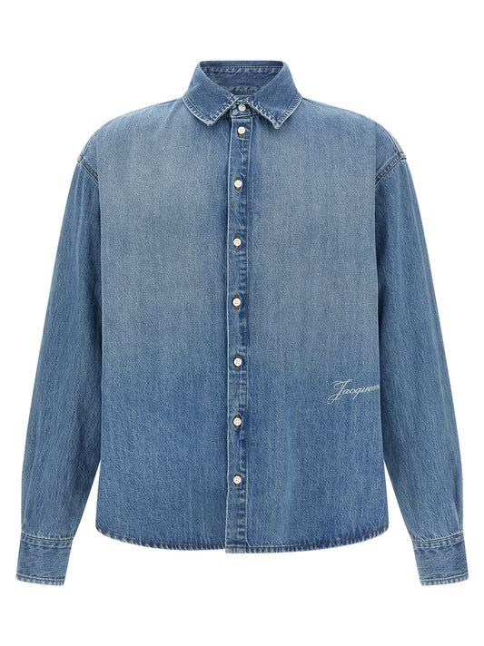 Shirt by Jacquemus for men in denim cotton blue showcases a sharp silhouette, elegantly detailed with a sharp and sharp long-sleeve.