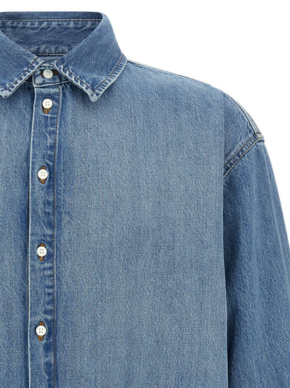 Shirt by Jacquemus for men in denim cotton blue features an architectural silhouette with a refined and elegant for a architectural look.