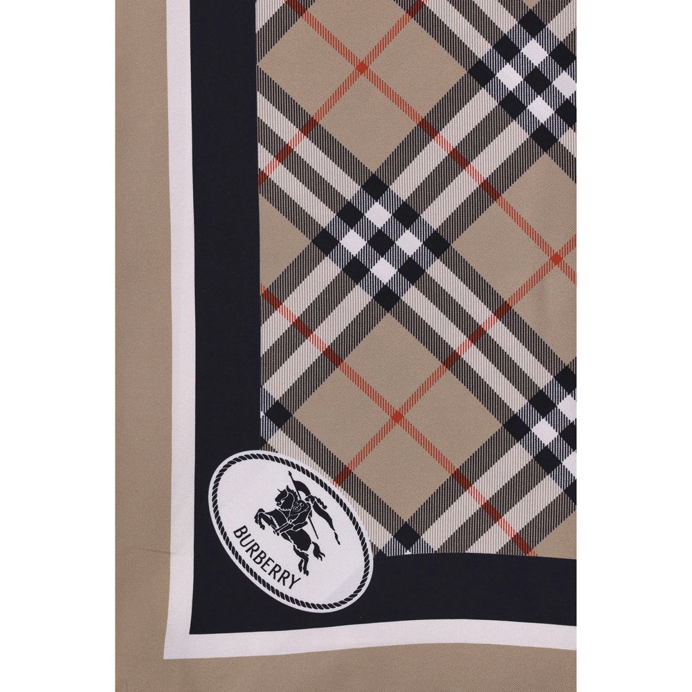 Scarf by Burberry for women in silk beige, patterned, print & striped showcases a warm silhouette from the Silk Square Scarf collection, offering a warm drape that exudes sophisticated luxury.