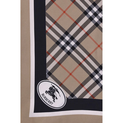 Scarf by Burberry for women in silk beige, patterned, print & striped showcases a warm silhouette from the Silk Square Scarf collection, offering a warm drape that exudes sophisticated luxury.