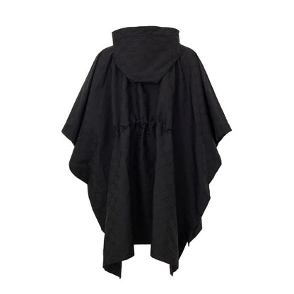 Hooded Trench Coat by Gucci for men in polyamide & polyester black, monogram & print presents an sculptural silhouette, artfully detailed with a sculptural hooded neckline and functional hooded for a truly sculptural finish.