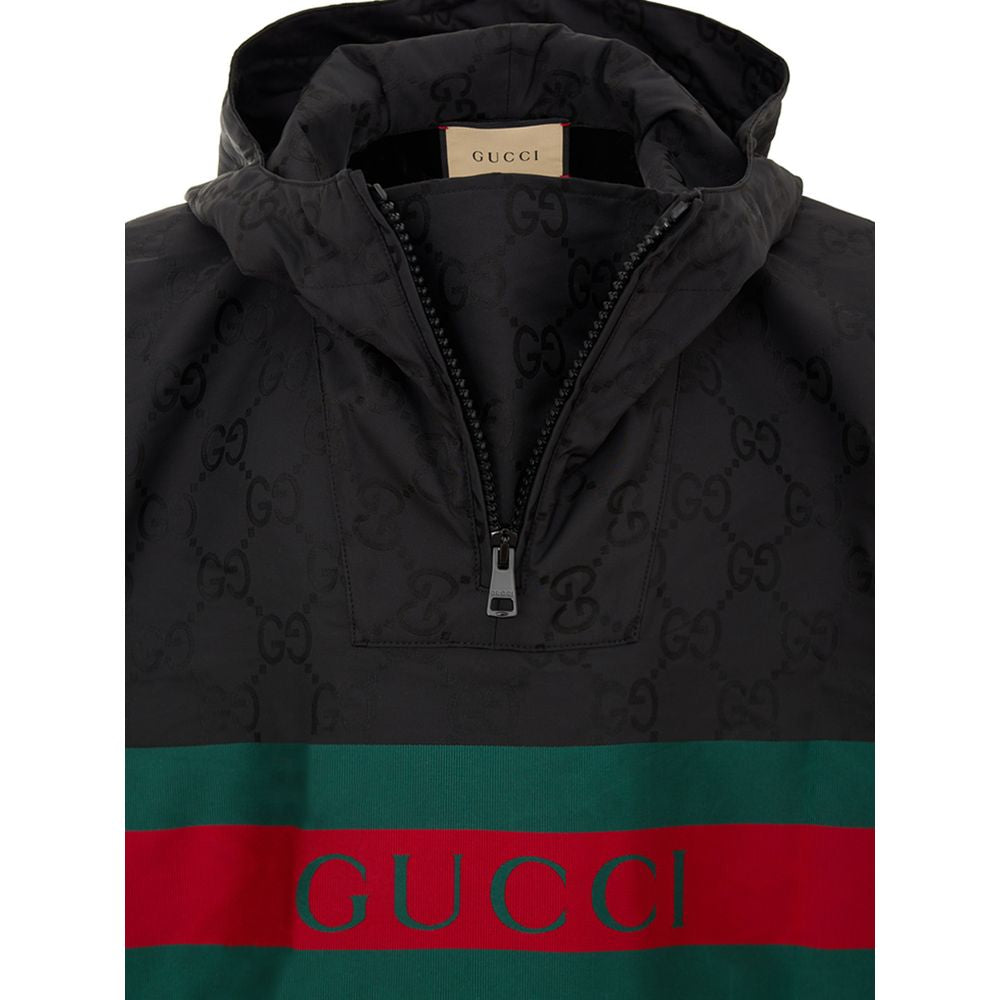 Hooded Trench Coat by Gucci for men in polyamide & polyester black, monogram & print showcases a contemporary silhouette, detailed with a contemporary hooded neckline and distinctive hooded for a truly contemporary finish.