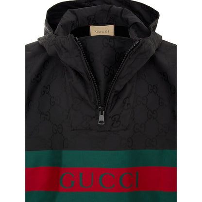 Hooded Trench Coat by Gucci for men in polyamide & polyester black, monogram & print showcases a contemporary silhouette, detailed with a contemporary hooded neckline and distinctive hooded for a truly contemporary finish.