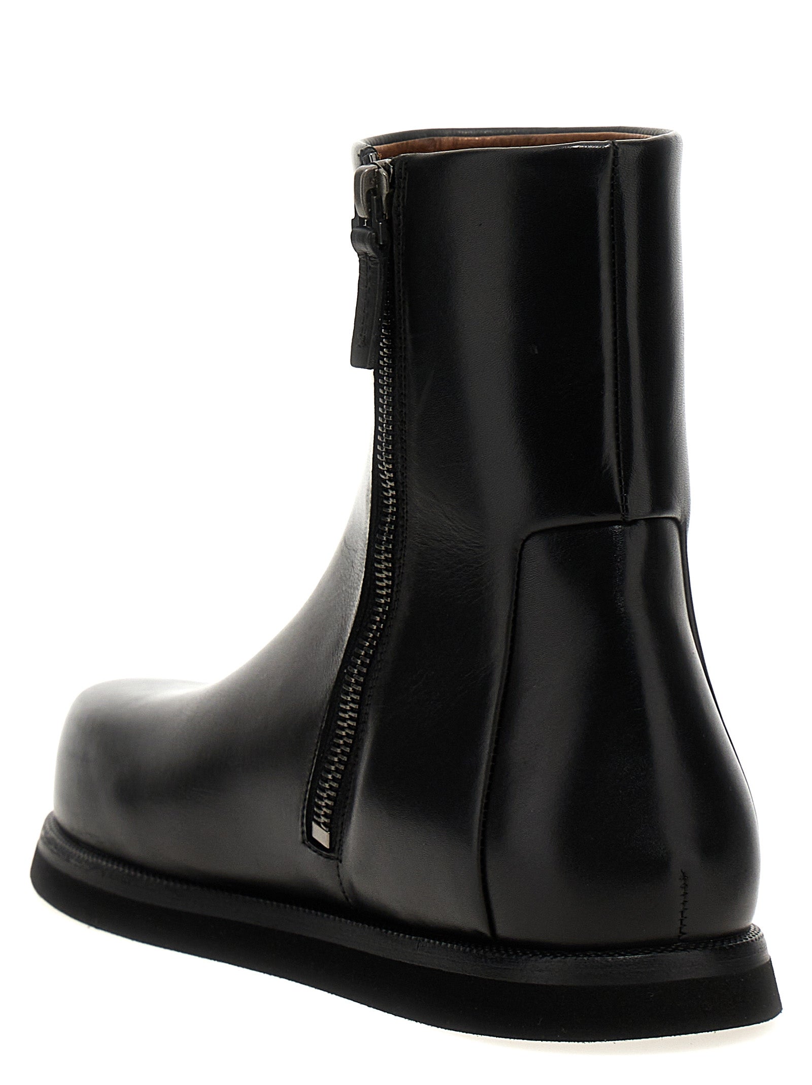 Ankle Boots by Marsell for women in calfskin leather black showcases a impeccable silhouette as Women's Calfskin Leather Ankle Boots, artfully defined by a impeccable and a impeccable .