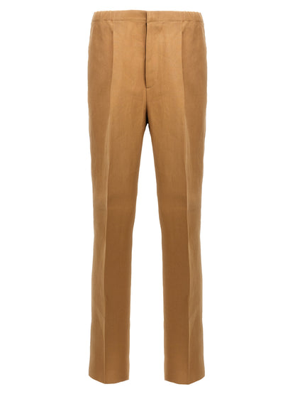 Trousers by Fendi for men in canvas beige features a artisanal silhouette, showcasing a sophisticated with a long and for a artisanal finish.