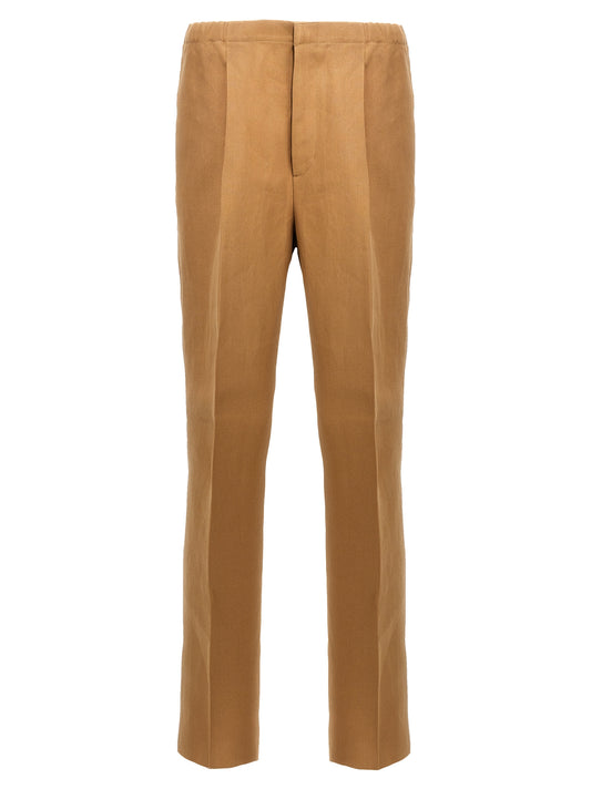 Trousers by Fendi for men in canvas beige features a artisanal silhouette, showcasing a sophisticated with a long and for a artisanal finish.
