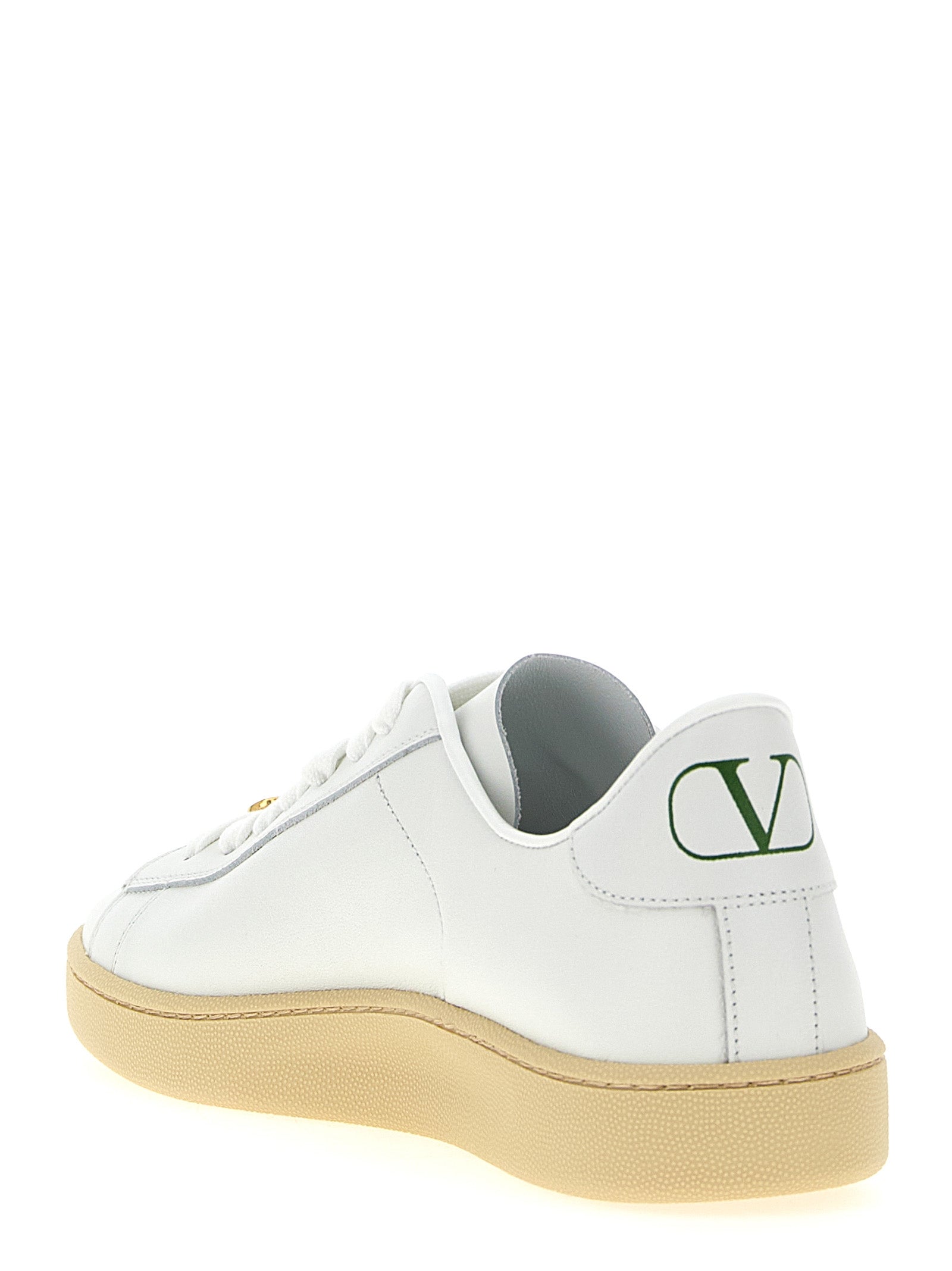 Sneakers by Valentino Garavani for men in calfskin leather white & signature features a chic design, perfectly showcasing the chic low-top style of this V Logo Men's Low Top Calfskin Leather Sneakers.