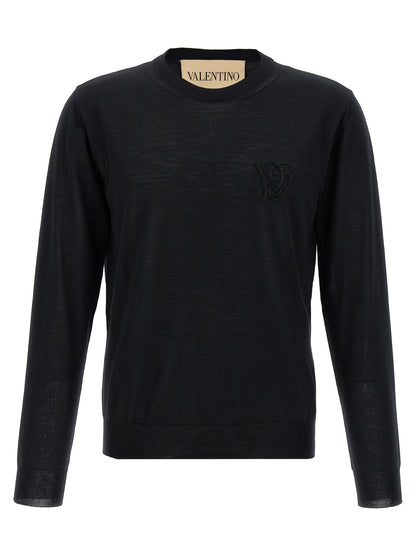Cardigan by Valentino Garavani for men in virgin wool black features an impeccable silhouette, showcasing a sophisticated crew neckline and detail for a truly impeccable finish.