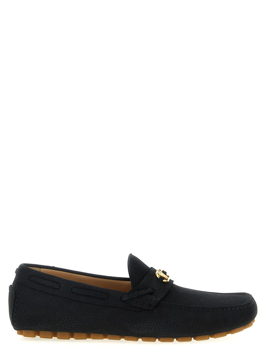 Loafer Slip-On Shoes by Valentino Garavani for men in calfskin leather black & signature showcases a resplendent V Logo Men's Calfskin Leather Loafer Slip-On Shoes aesthetic, defined by its resplendent and elegant .