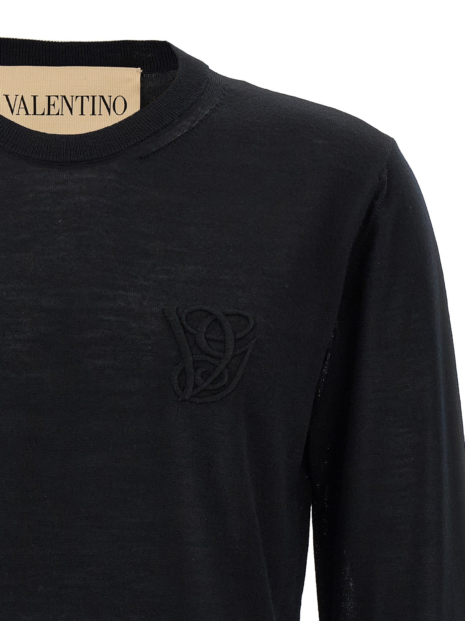 Cardigan by Valentino Garavani for men in virgin wool black features an crisp silhouette, showcasing a sophisticated crew neckline and detail for a truly crisp finish.