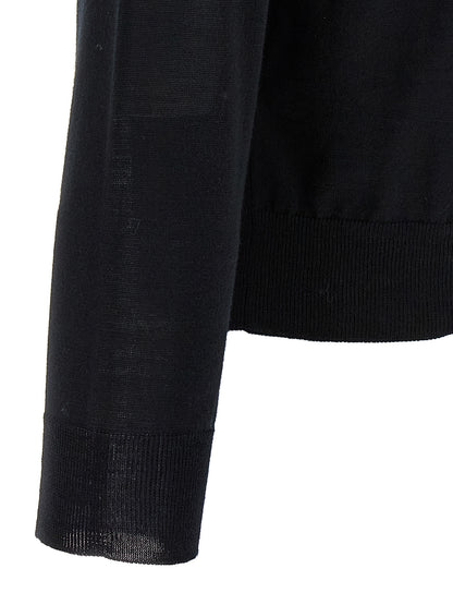 Cardigan by Valentino Garavani for men in virgin wool black showcases a captivating silhouette, artfully detailed with a captivating and for a truly sophisticated captivating look.