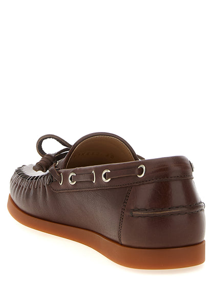 Boat Flat Shoes by Valentino Garavani for men in buffalo leather brown & signature showcases a enchanting silhouette as part of the V Logo Men's Buffalo Leather Boat Flat Shoes collection, defined by a enchanting and for a enchanting look.