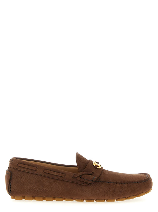 Loafer Slip-On Shoes by Valentino Garavani for men in bos taurus suede calfskin leather brown & signature showcases a timeless silhouette from the V Logo Men's Bos Taurus Suede Calfskin Leather Loafer Slip-On Shoes collection, featuring a timeless and for a timeless finish.
