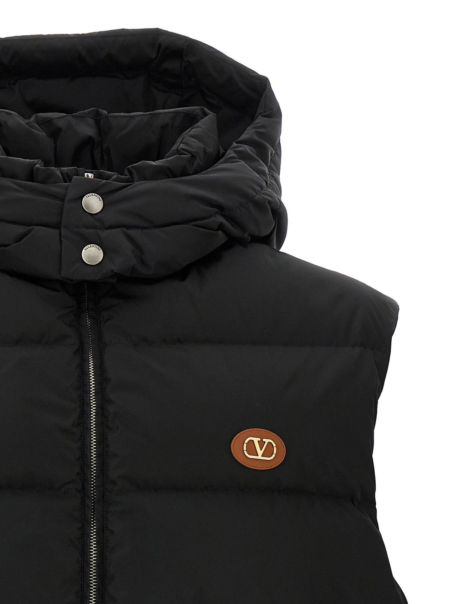 Hooded Vest by Valentino Garavani for men in polyamide black & signature features a enviable silhouette, elegantly detailed with a enviable hooded high-neck neckline and functional hooded & insulated for a enviable finish.