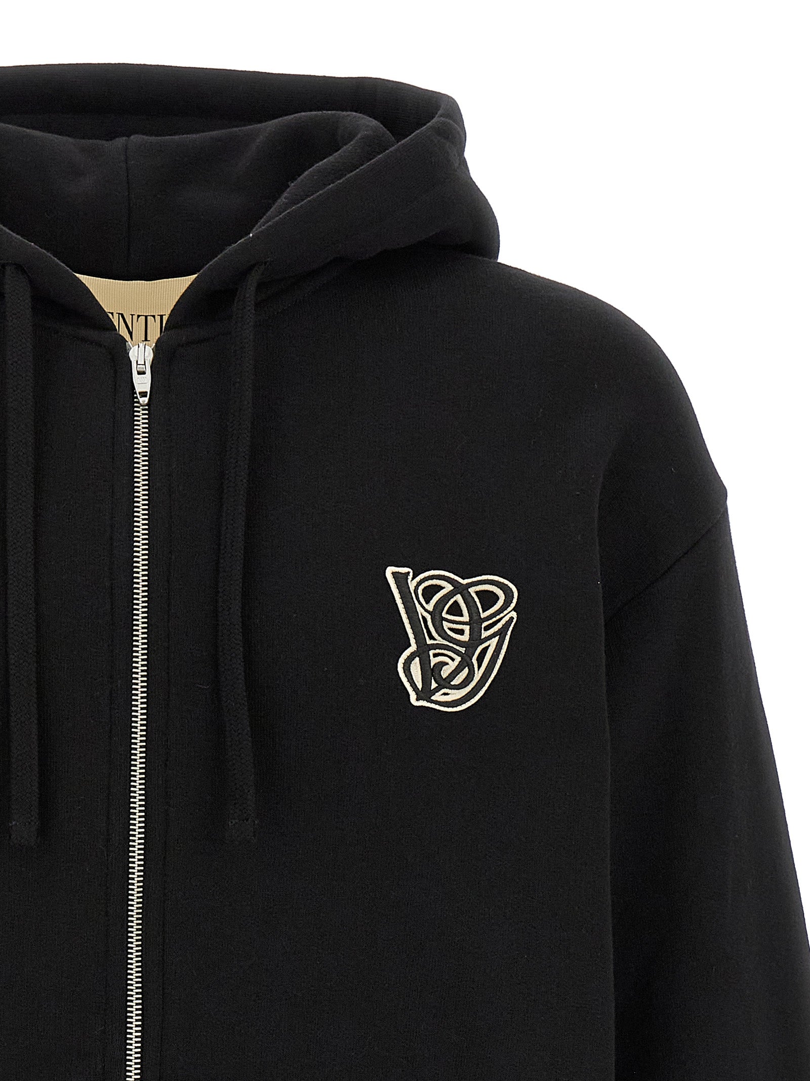 Sweatshirt Hoodie by Valentino Garavani for men in cotton black features an dramatic silhouette, showcasing a sophisticated hooded neckline and dramatic for a refined, modern aesthetic.