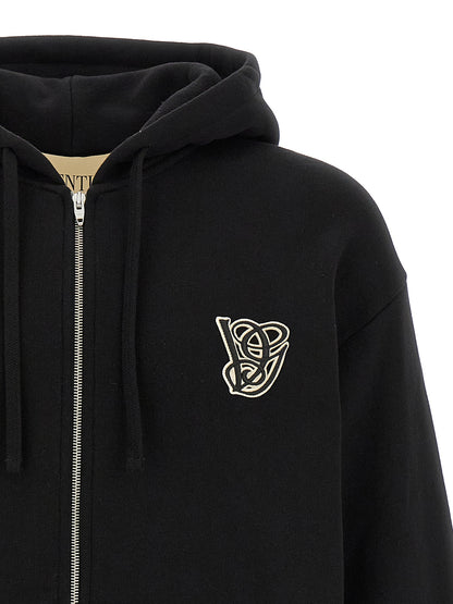 Sweatshirt Hoodie by Valentino Garavani for men in cotton black features an dramatic silhouette, showcasing a sophisticated hooded neckline and dramatic for a refined, modern aesthetic.
