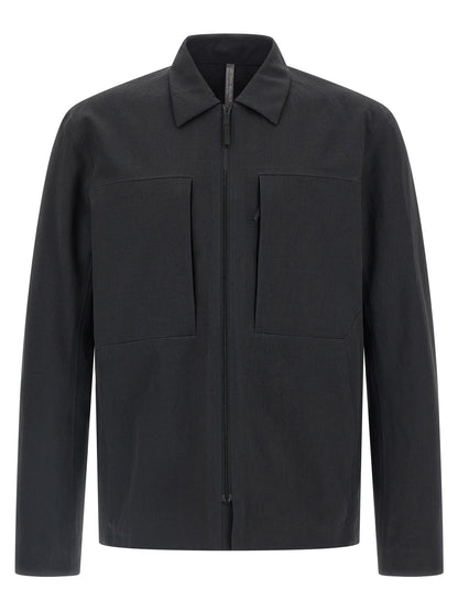 Overshirt by Arc'teryx Veilance for men in polyester black showcases a sleek silhouette, elegantly detailed with a sleek and for a sleek finish.