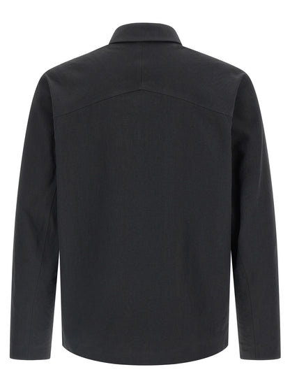 Overshirt by Arc'teryx Veilance for men in polyester black showcases a sublime silhouette, artfully detailed with a sublime and for a sophisticated, sublime finish.