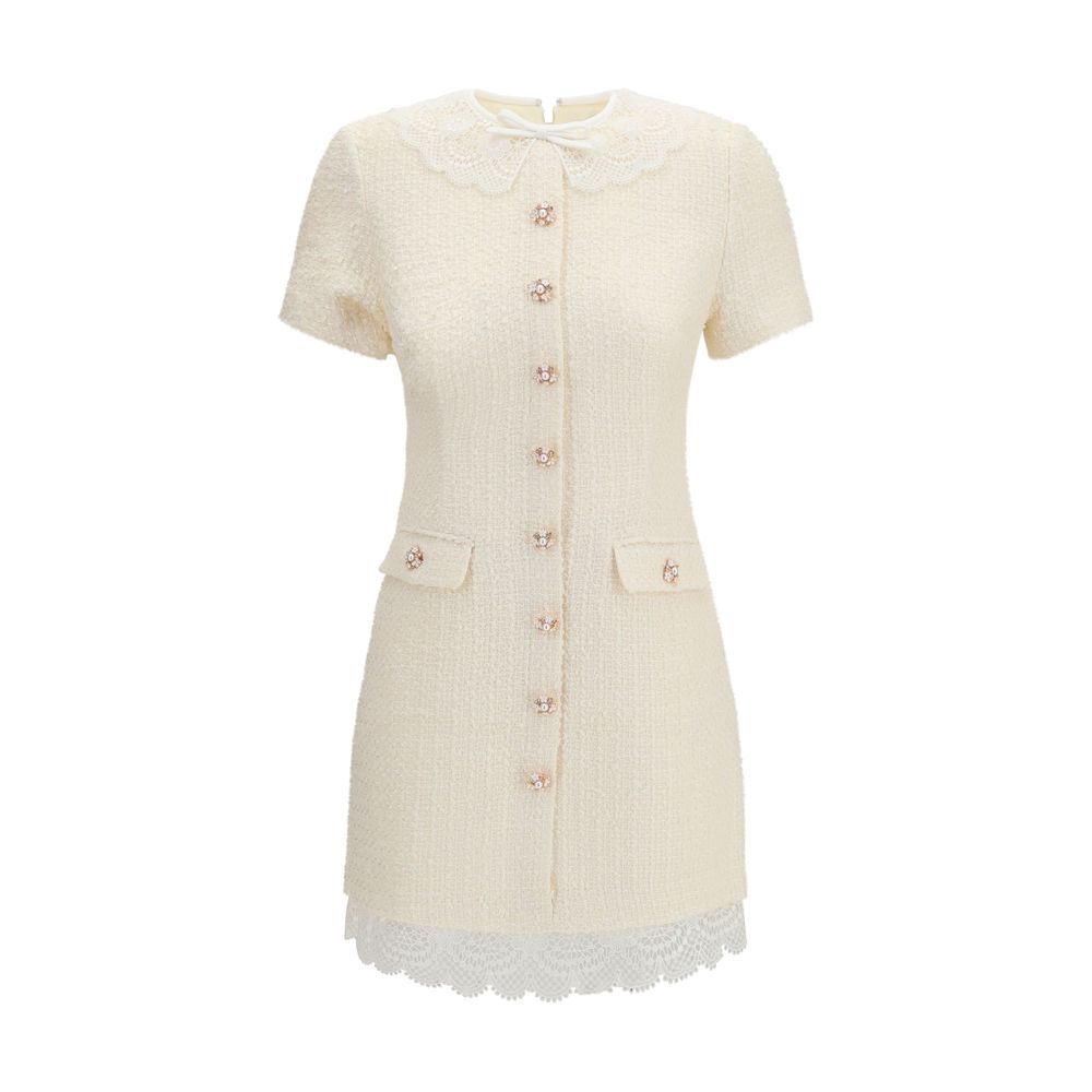 Dress by Self-Portrait for women in wool polyester & polyamide beige, pearl, patterned & floral features an sultry silhouette defined by a and short-sleeve, falling to an sultry short mini for a sultry look.