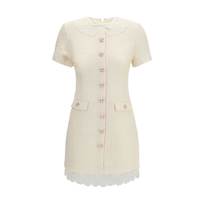 Dress by Self-Portrait for women in wool polyester & polyamide beige, pearl, patterned & floral features an sultry silhouette defined by a and short-sleeve, falling to an sultry short mini for a sultry look.