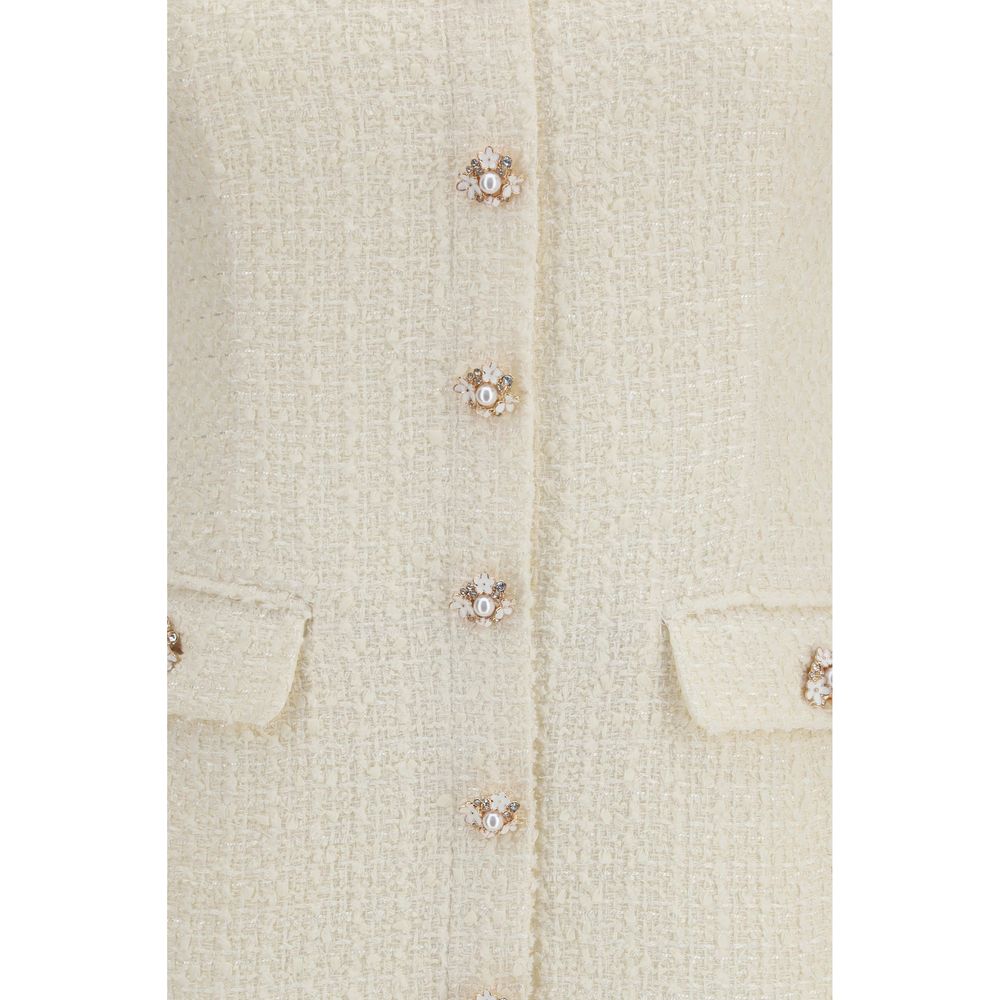 Dress by Self-Portrait for women in wool polyester & polyamide beige, pearl, patterned & floral features an eye catching silhouette with a sophisticated , elegant , and a refined short mini for a eye catching aesthetic.