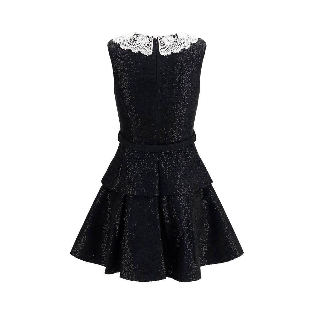 Dress by Self-Portrait for women in polyester viscose & sequins black & patterned features an cute silhouette, detailed with a and that elegantly flows into a cute short mini.