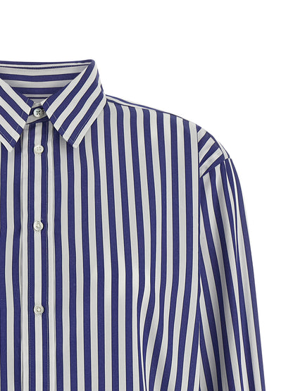 Blouse by Polo Ralph Lauren for women in cotton blue & striped presents a discerning silhouette, showcasing a sophisticated and for a truly discerning finish.