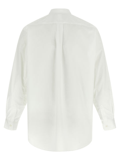 Shirt by Comme Des Garçons for men in cotton multicolor & patterned features an polished silhouette, showcasing a sophisticated and detail for a truly polished finish.