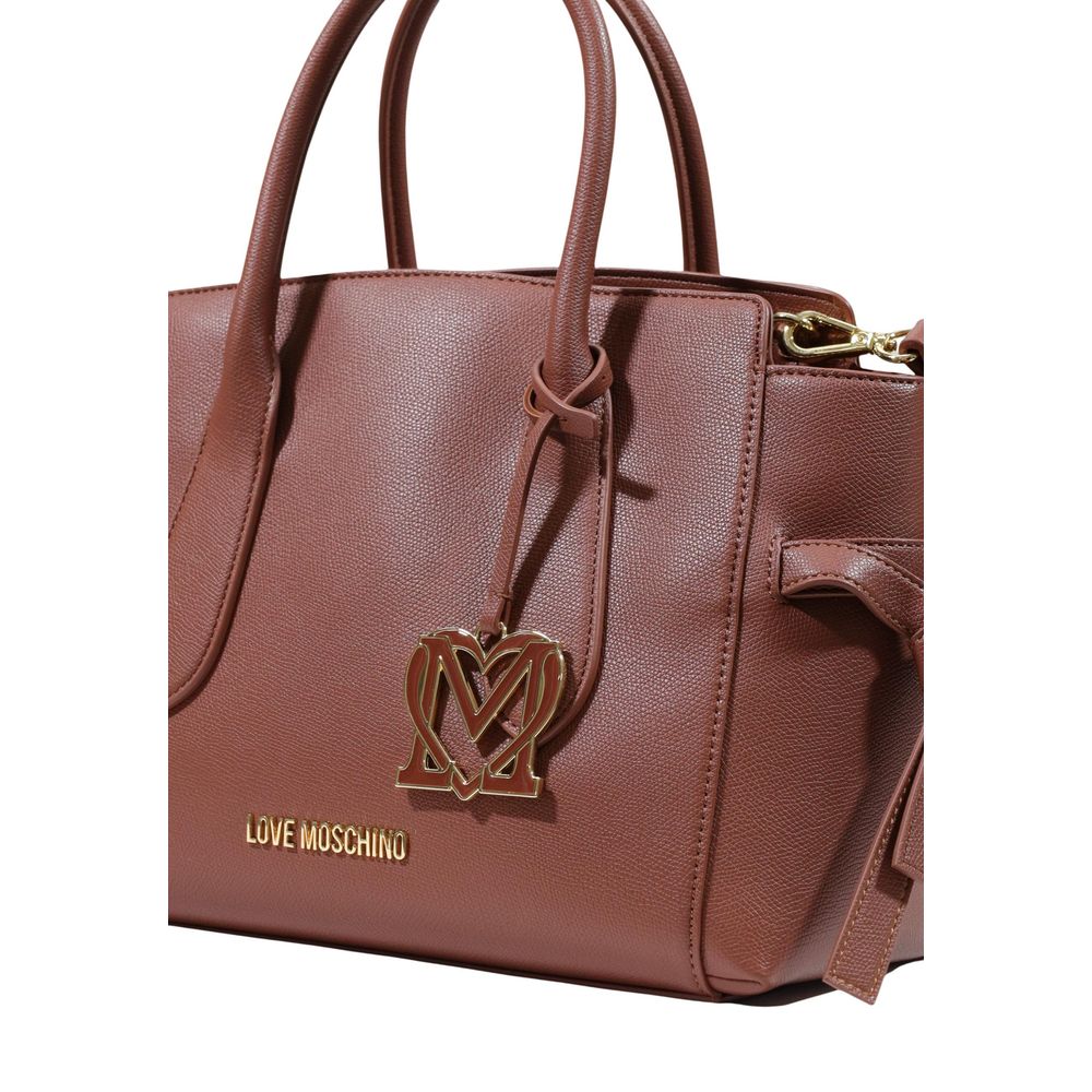 This Large Handbag by Love Moschino for women in polyethylene & polyurethane and brown, gold & monogram presents a sculptural silhouette featuring a secure buckle, ample , and versatile handle for a sculptural finish.