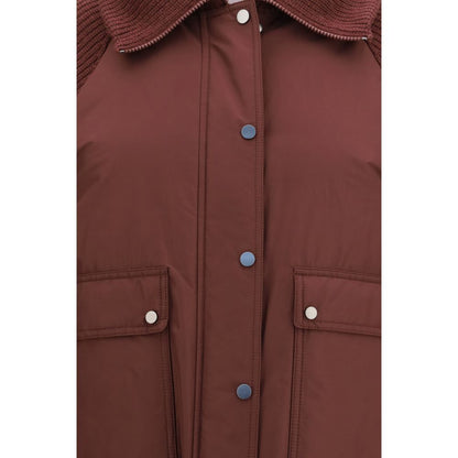 Puffer Jacket by Brunello Cucinelli for women in wool polyester & goose-down bordeaux showcases a bohemian silhouette, artfully detailed with a bohemian and signature pockets & insulated for a truly bohemian finish.