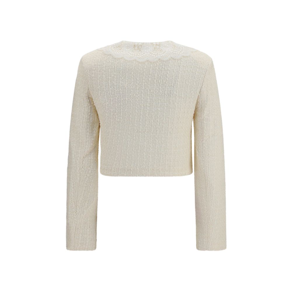Overcoat by Self-Portrait for women in wool polyester & polyamide beige presents a luxurious silhouette, showcasing a luxurious and sophisticated for a premium, luxurious look.