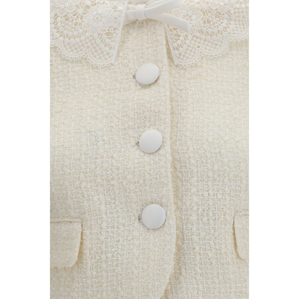 Overcoat by Self-Portrait for women in wool polyester & polyamide beige showcases a enveloping silhouette, detailed with distinctive and a enveloping .