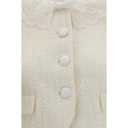 Overcoat by Self-Portrait for women in wool polyester & polyamide beige showcases a enveloping silhouette, detailed with distinctive and a enveloping .