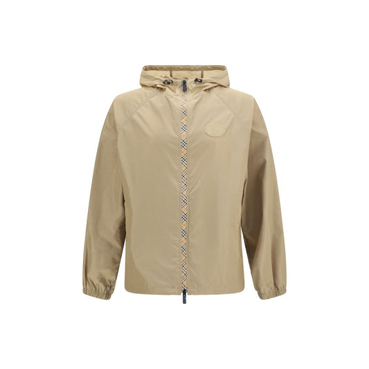 Hooded Jacket by Burberry for men in nylon beige showcases a enveloping silhouette, artfully detailed with a enveloping hooded neckline and premium lightweight, pockets, hooded & windproof for a truly enveloping finish.
