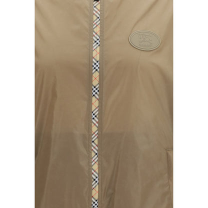 Hooded Windbreaker Jacket by Burberry for men in nylon brown showcases a urban chic silhouette, detailed with a urban chic hooded neckline and functional lightweight, pockets, hooded & windproof for a polished finish.