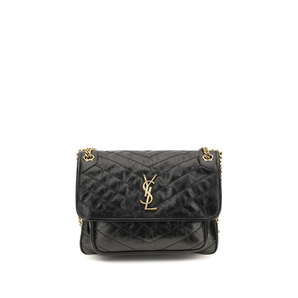2-in-1 Shoulder & Crossbody Flap Bag by Saint Laurent for women in bos taurus calf leather black, chevron & signature features an effortlessly chic silhouette with a secure flap, ample built-in-compartments, and versatile crossbody-strap & shoulder-strap for effortlessly chic everyday luxury.