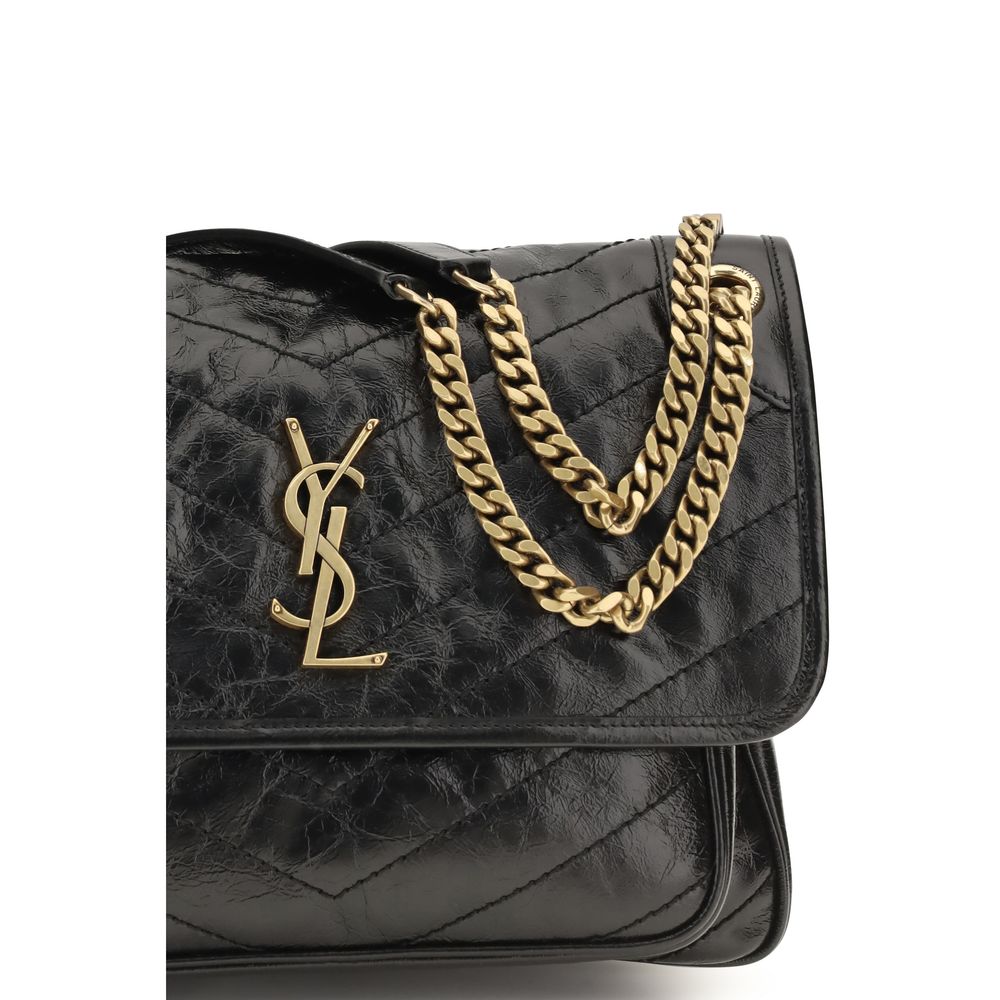 2-in-1 Shoulder & Crossbody Flap Bag by Saint Laurent for women in bos taurus calf leather black, chevron & signature showcases a enviable silhouette, artfully detailed with a secure flap, organized built-in-compartments, and versatile crossbody-strap & shoulder-strap for a enviable look.