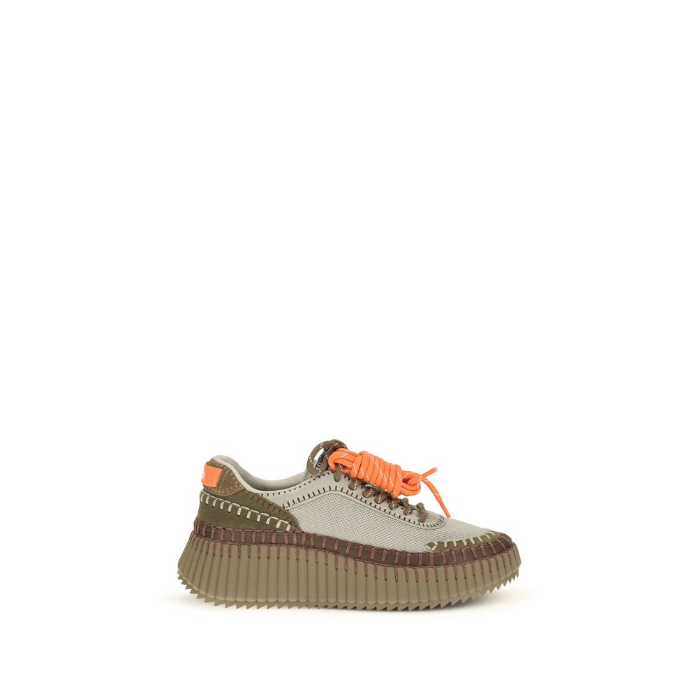 Athletic Sneakers by Chloé for women in tu polyurethane & suede calfskin leather bicolour features an effortless chic silhouette, showcasing the signature athletic style of the Women's Athletic TU Polyurethane & Suede Calfskin Leather Sneakers collection with a truly effortless chic finish.