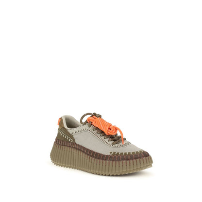 Athletic Sneakers by Chloé for women in tu polyurethane & suede calfskin leather bicolour showcases an impeccable silhouette, defined by an impeccable athletic style design that perfectly captures the essence of the Women's Athletic TU Polyurethane & Suede Calfskin Leather Sneakers.
