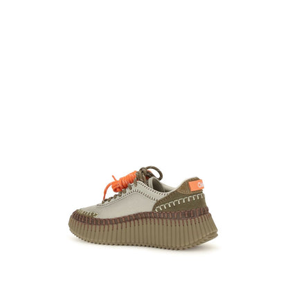 Athletic Sneakers by Chloé for women in tu polyurethane & suede calfskin leather bicolour showcases a architectural silhouette, artfully capturing the essence of the Women's Athletic TU Polyurethane & Suede Calfskin Leather Sneakers with its signature architectural athletic style construction.