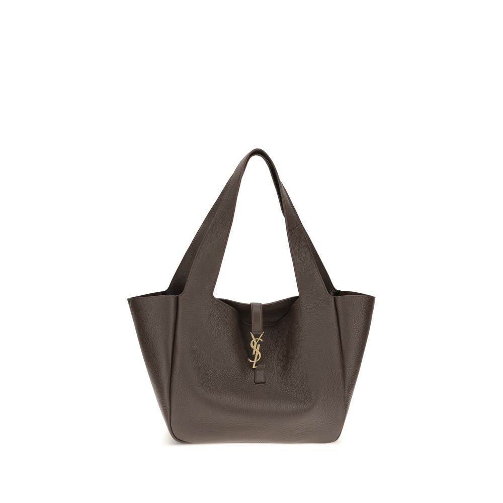 Shoulder Flap Bag by Saint Laurent for women in polyurethane bos taurus calf & deerskin leather brown features a distinguished silhouette, showcasing a secure flap and distinguished single-compartment with versatile shoulder-strap for a distinguished finish.