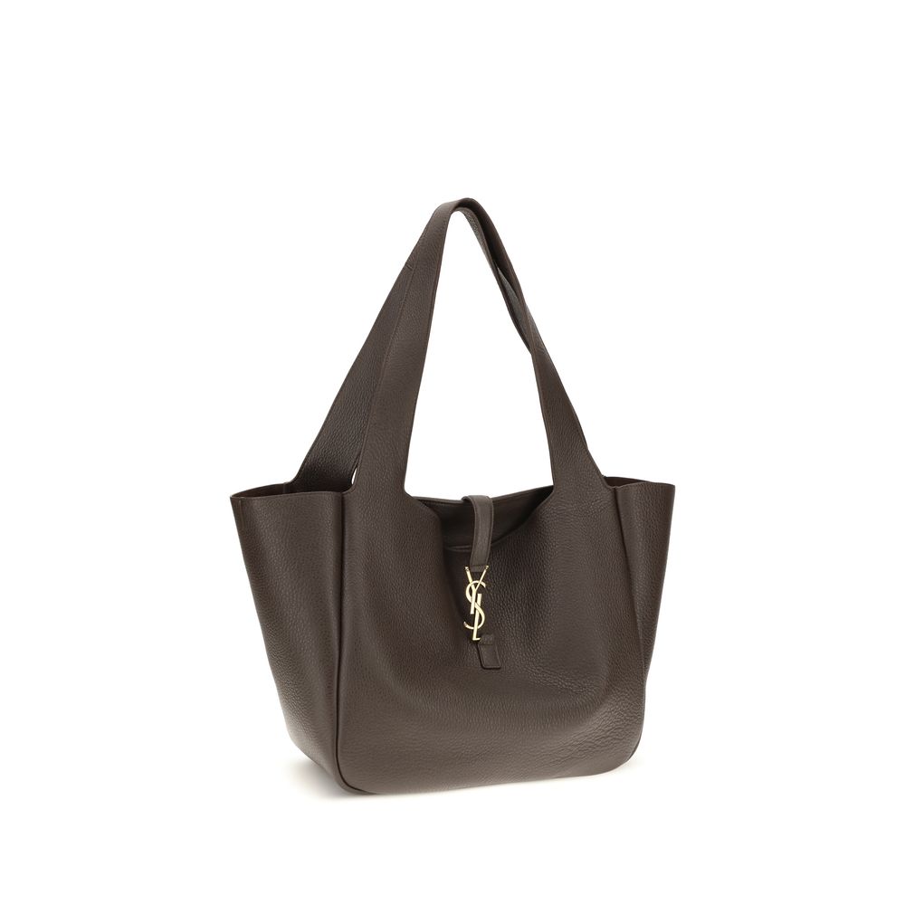 Shoulder Flap Bag by Saint Laurent for women in polyurethane bos taurus calf & deerskin leather brown presents a versatile silhouette, showcasing a secure flap and versatile single-compartment with versatile shoulder-strap for a sophisticated look.