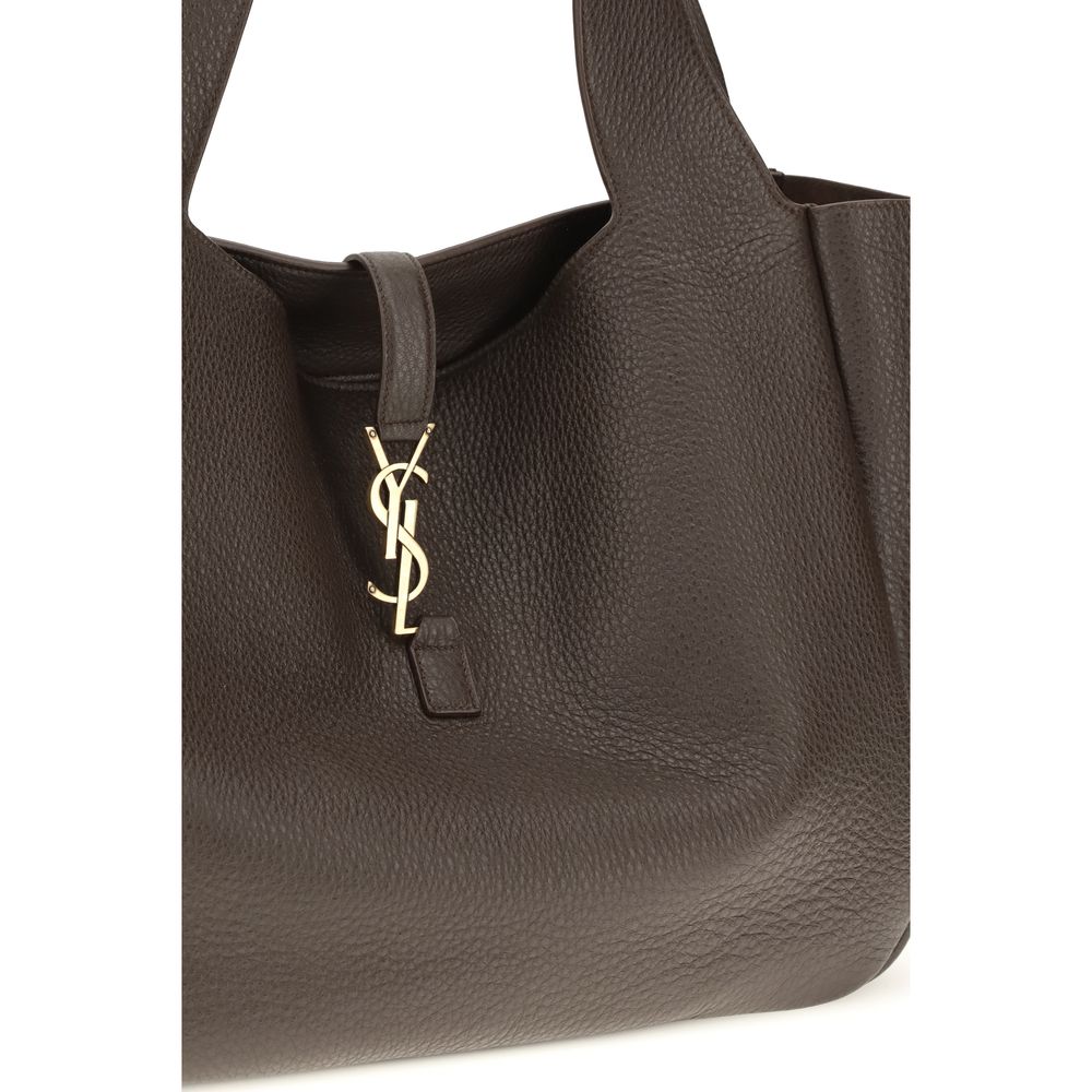 Shoulder Flap Bag by Saint Laurent for women in polyurethane bos taurus calf & deerskin leather brown features an effortlessly chic silhouette with a secure flap, ample single-compartment, and versatile shoulder-strap for effortlessly chic everyday luxury.