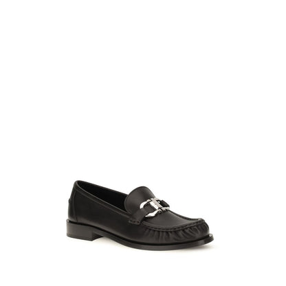 Loafer Slip-On Shoes by Ferragamo for women in bos taurus calf leather black features an ergonomic silhouette, perfectly showcasing Gancini Women's Bos Taurus Calf Leather Loafer Slip-On Shoes with its distinct block-heel and elegant round toe style.