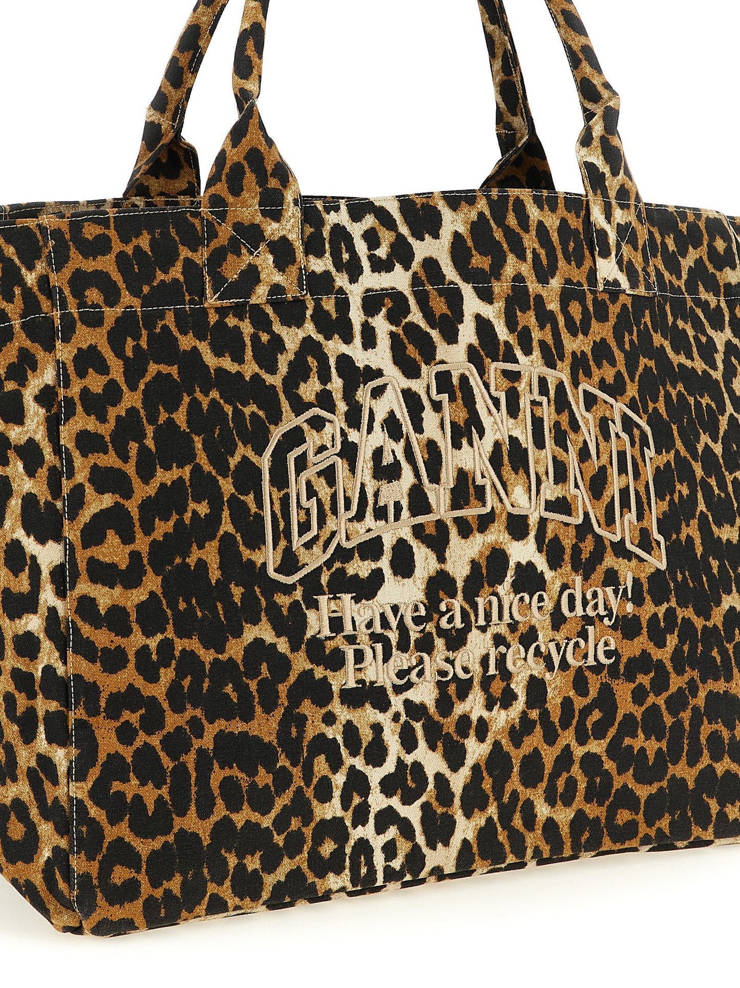 Tote Bag by Ganni for women in cotton canvas black, brown, leopard-print & print features an jet-set Cotton Canvas Tote Bag design with a secure zipper, ample , and versatile handle for an jet-set finish.