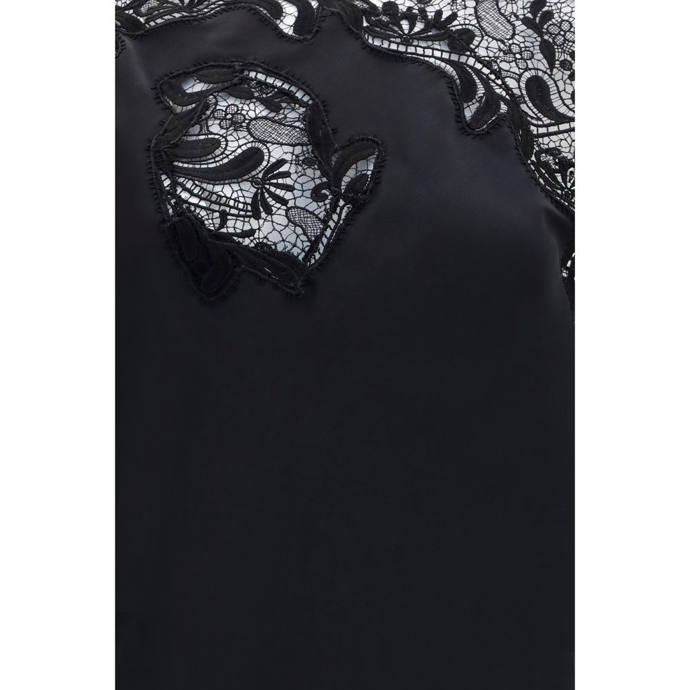 Dress by Ferragamo for women in silk black showcases a striking silhouette, elegantly detailed with a , refined , and a striking long for a striking finish.