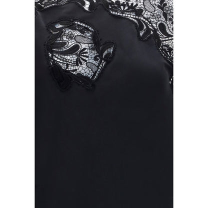 Dress by Ferragamo for women in silk black showcases a striking silhouette, elegantly detailed with a , refined , and a striking long for a striking finish.